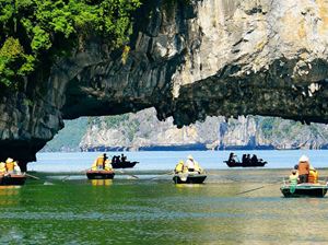 Explore the stunning limestone karsts and emerald waters of Ha Long Bay. 