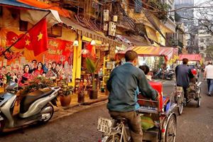 The vibrant energy of Hanoi's Old Quarter with its bustling streets