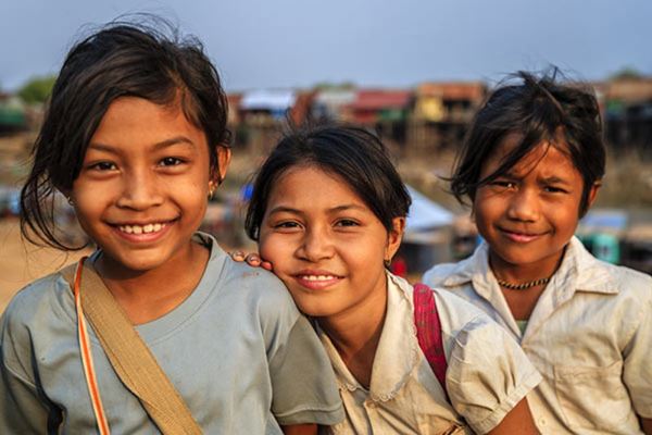 Cambodian children with beautiful smiles are friendly towards tourists