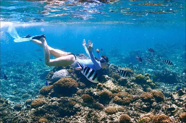 Immerse yourself in the mesmerizing underwater world of Phuket with snorkeling experiences.