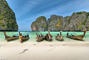 A beach in Phuket with crystal clear light blue waters
