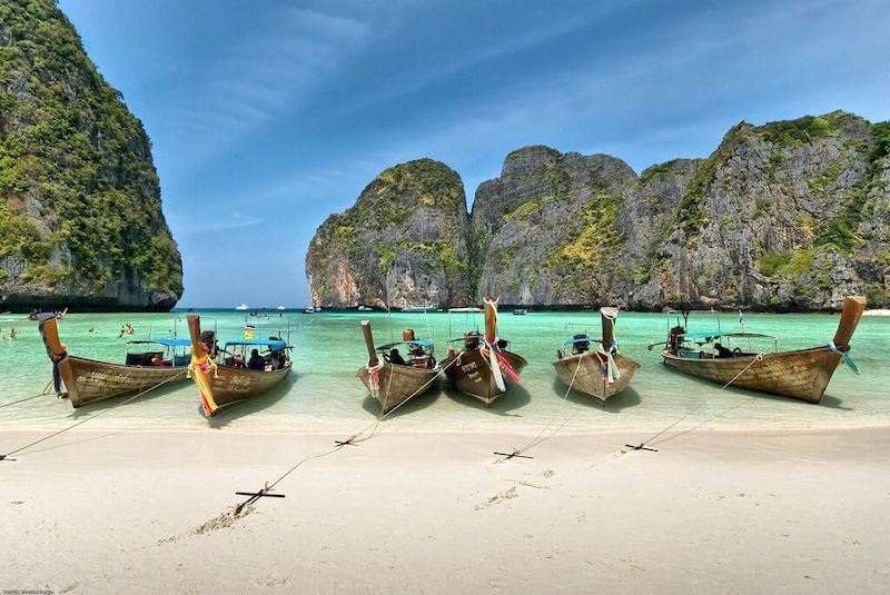A beach in Phuket with crystal clear light blue waters