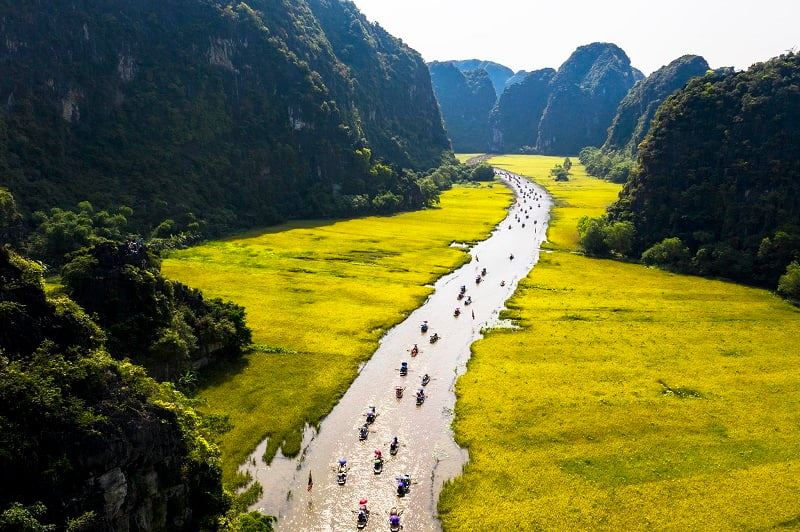 Rural tranquility and boat rides through Ninh Binhs lush Tam Coc.