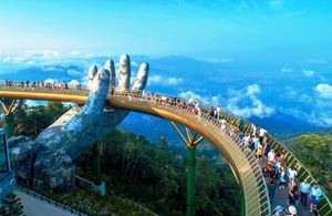 The stunning architecture of the Golden Hands Bridge, with its giant stone hands